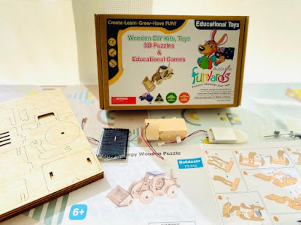 Model Bulldozer Tipper truck: Solar or battery powered plywood model-includes Motor or Solar powered options plus paint brush set Deals499