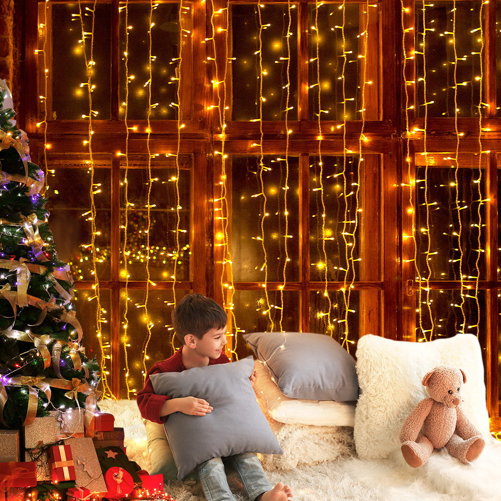 Jingle Jollys 6X3M Christmas Curtain Lights 600LED Warm White Deals499