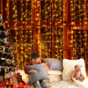 Jingle Jollys 6X3M Christmas Curtain Lights 600LED Warm White Deals499