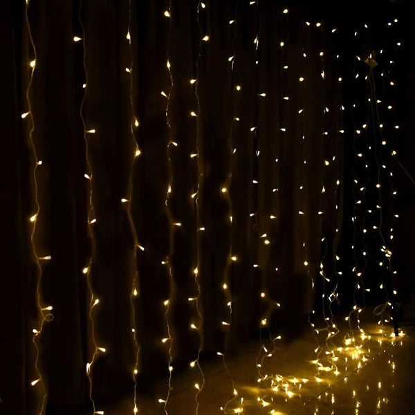 Jingle Jollys 6X3M Christmas Curtain Lights 600LED Warm White Deals499