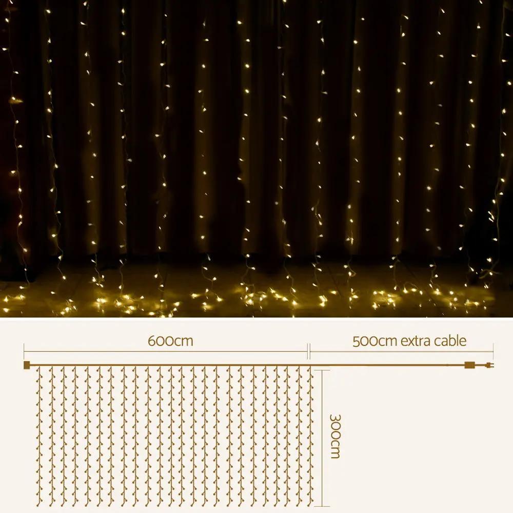 Jingle Jollys 6X3M Christmas Curtain Lights 600LED Warm White Deals499