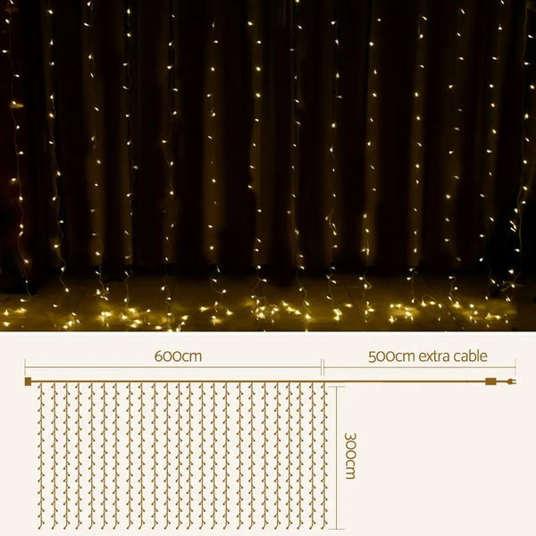Jingle Jollys 6X3M Christmas Curtain Lights 600LED Warm White Deals499