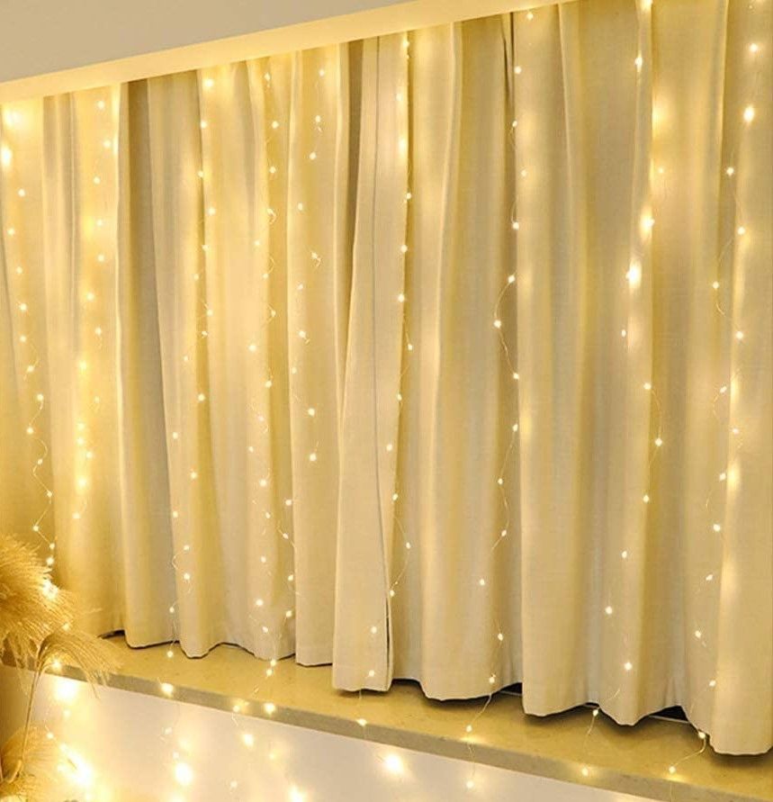300 LEDs Window Curtain Fairy Lights 8 Modes and Remote Control for Bedroom (Warm White, 300 x 300cm) Deals499