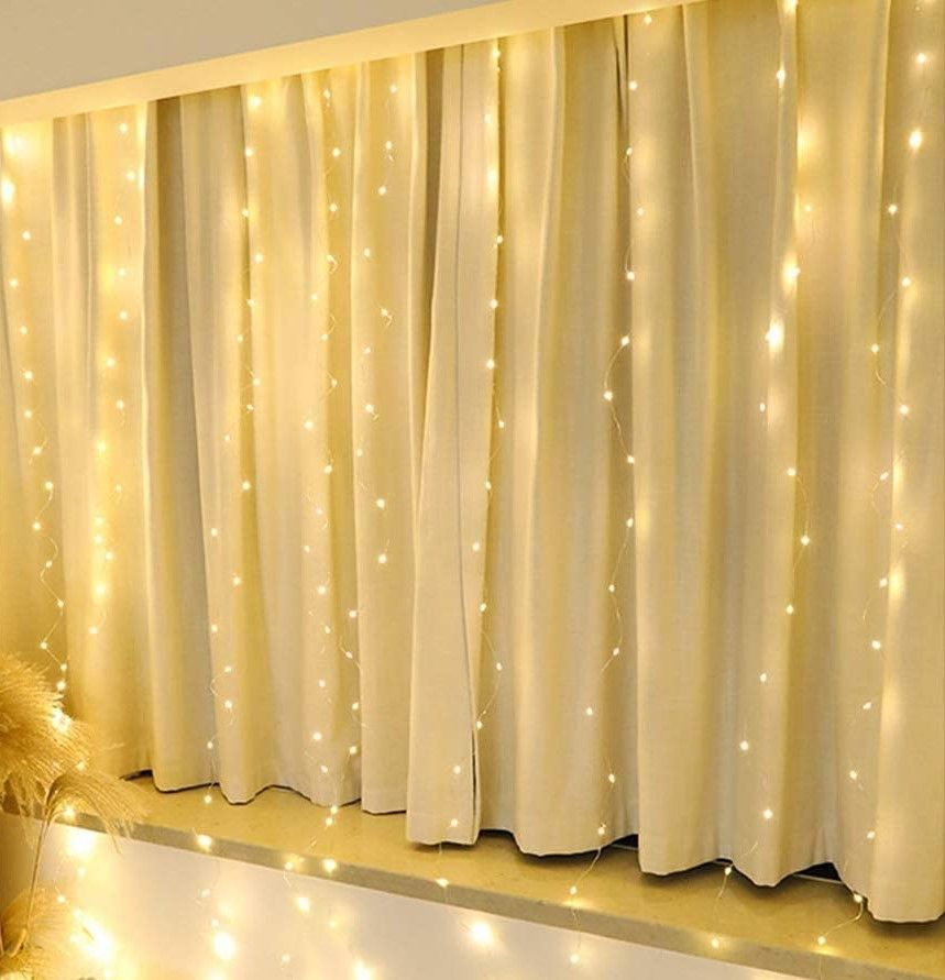 300 LEDs Window Curtain Fairy Lights 8 Modes and Remote Control for Bedroom (Warm White, 300 x 300cm) Deals499